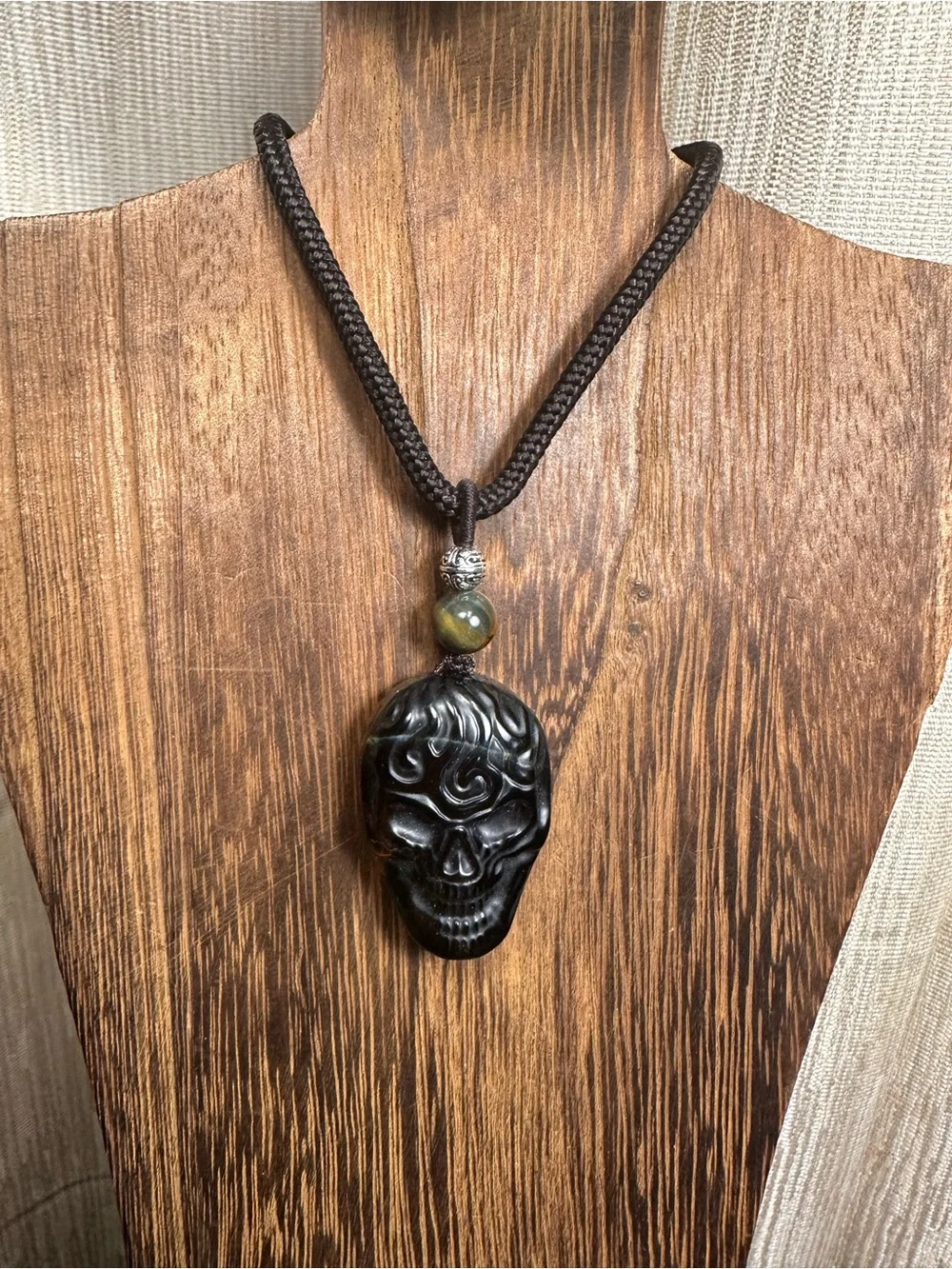 Unique Blue and Golden Tiger’s Eye Skull Carving Pendant Necklace on Brown